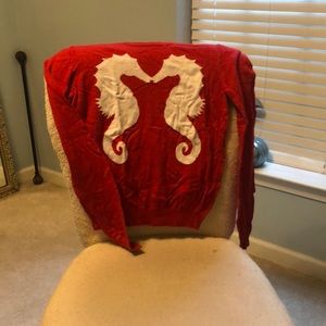 Red and white seahorse sweater